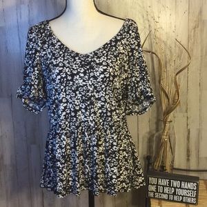 Day trip ladies blouse with cute back.